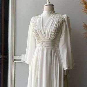 White dress. Size 44.